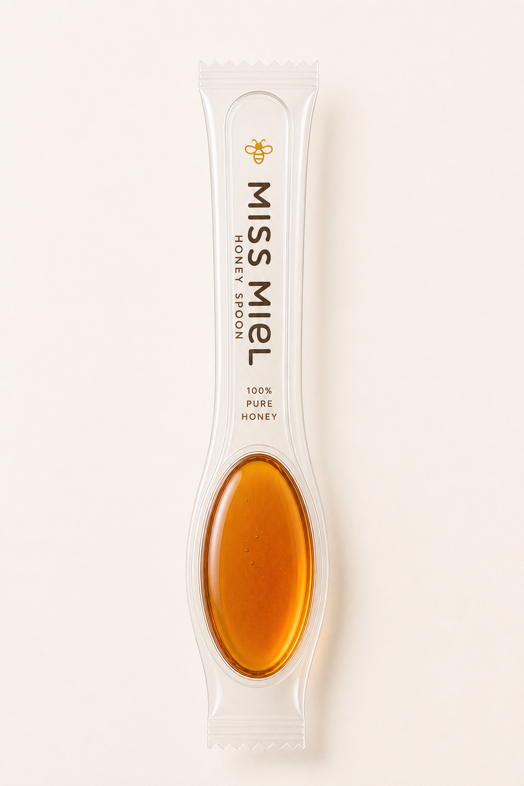 Miss Miel single-serve honey spoon, sealed in clear packaging